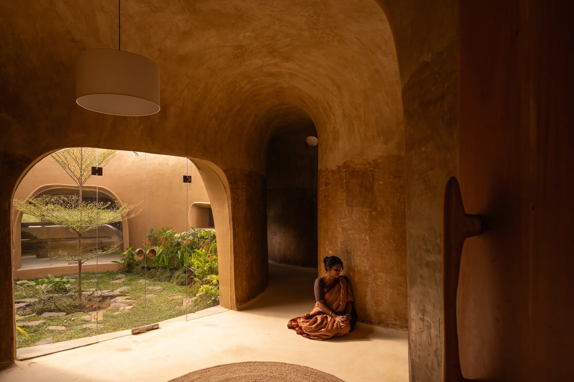 The living space opens onto the central courtyard