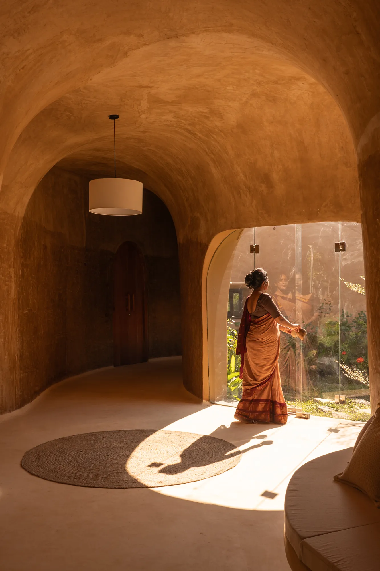 Light pools through the glazed courtyard opening